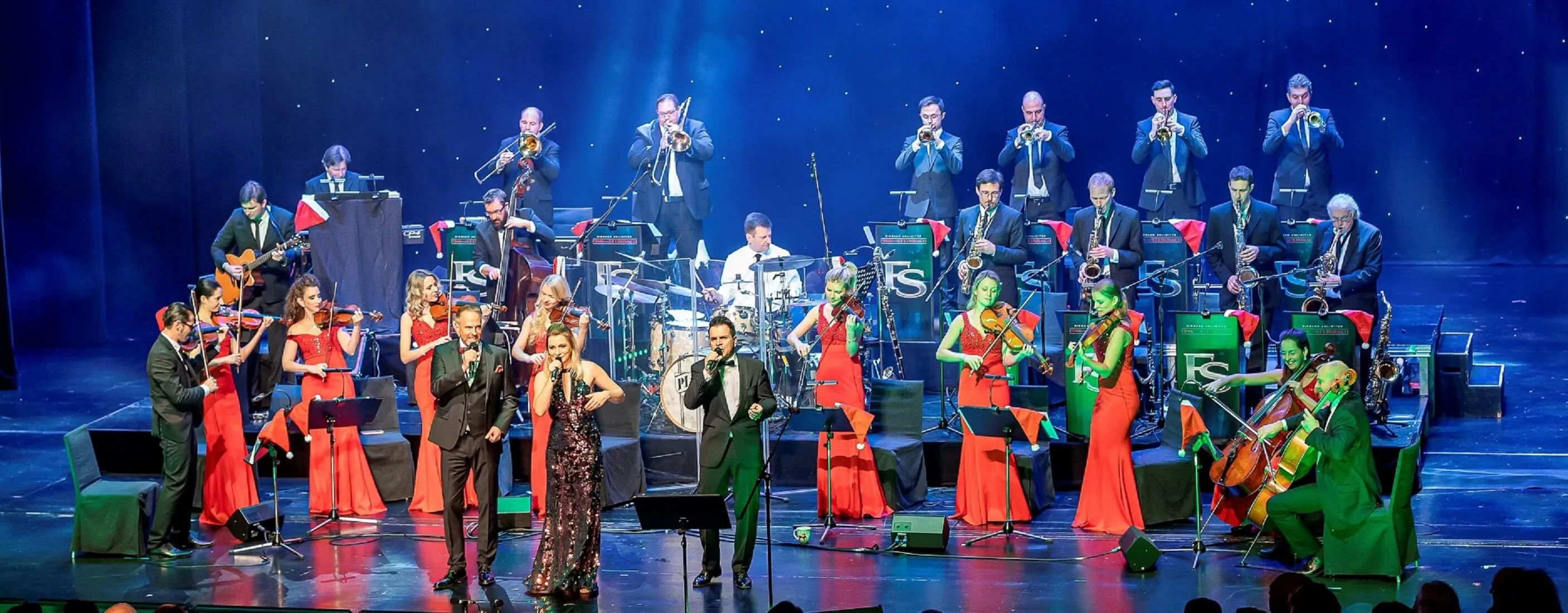 Die Bigband Steinbach in voller größe mit Streichern live auf der Bühne bei einem Firmenevent.